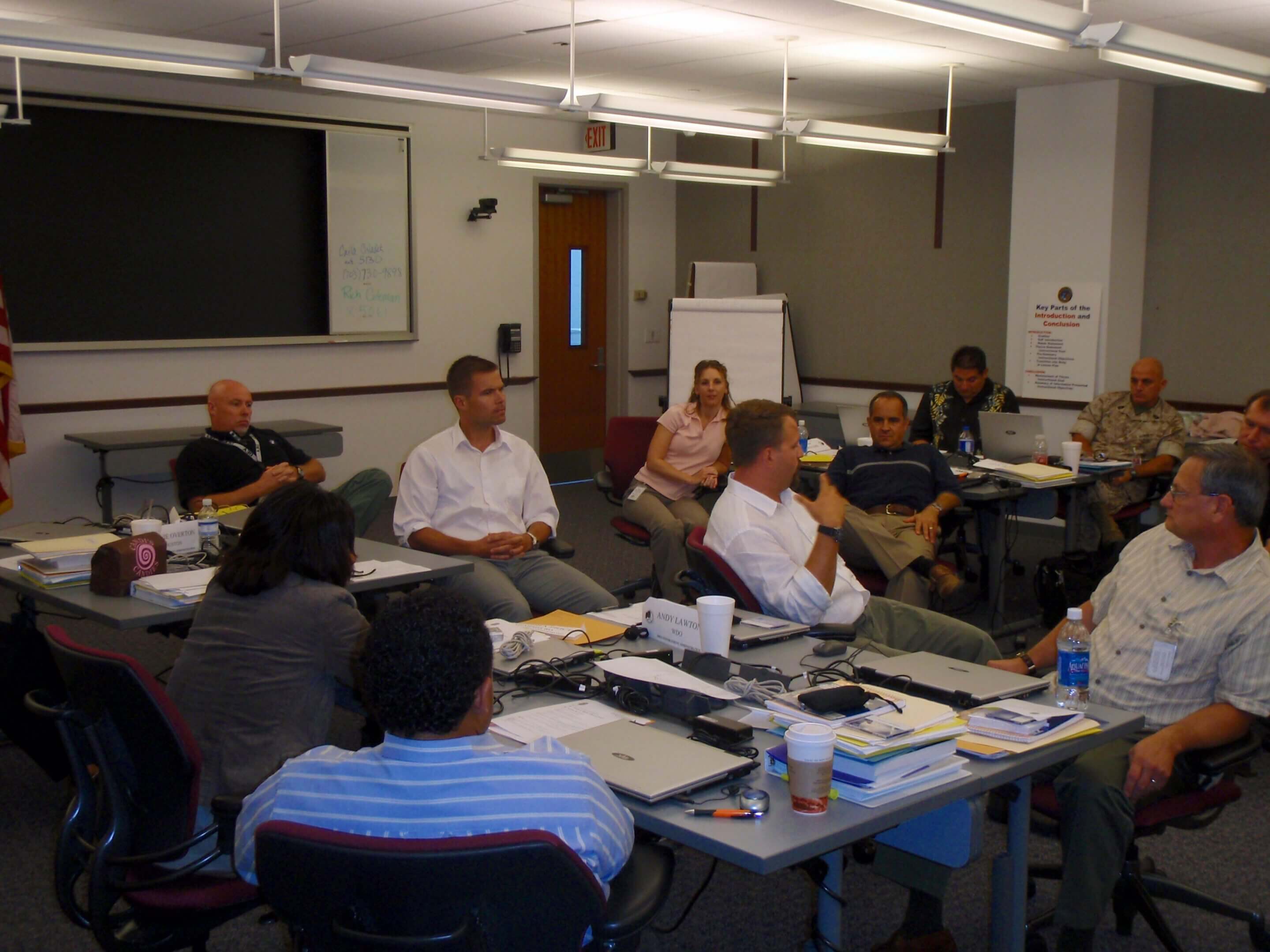 Group discussion in a classroom setting with diverse participants.
